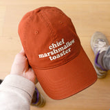 Alphabet Bags - Chief Marshmallow Toaster - Cotton Baseball Cap